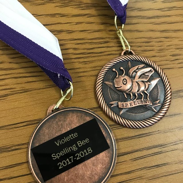Everyone walks away a winner at Violette's spelling bee! These lovely medals are handed out to all contestants!