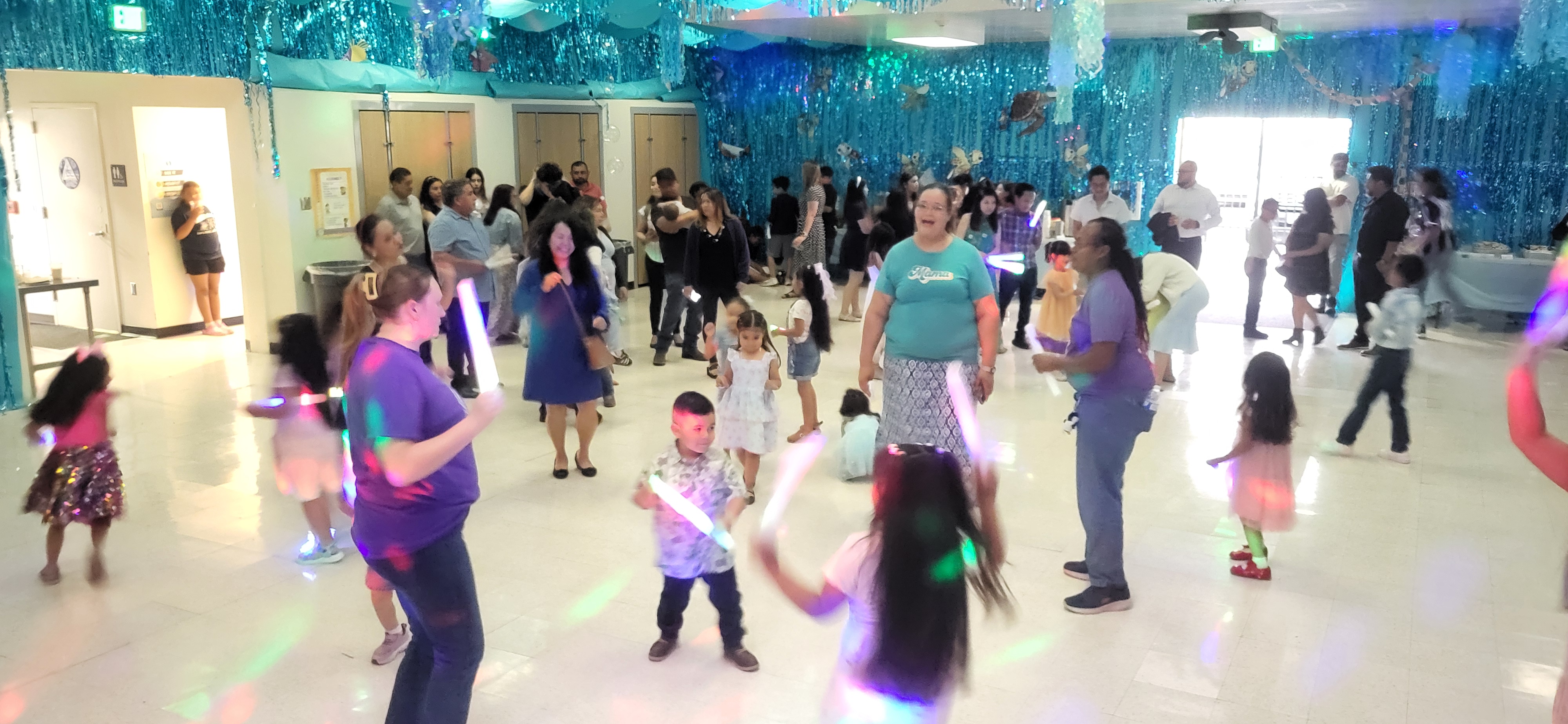 Families have a great time dancing it out at our family dance!