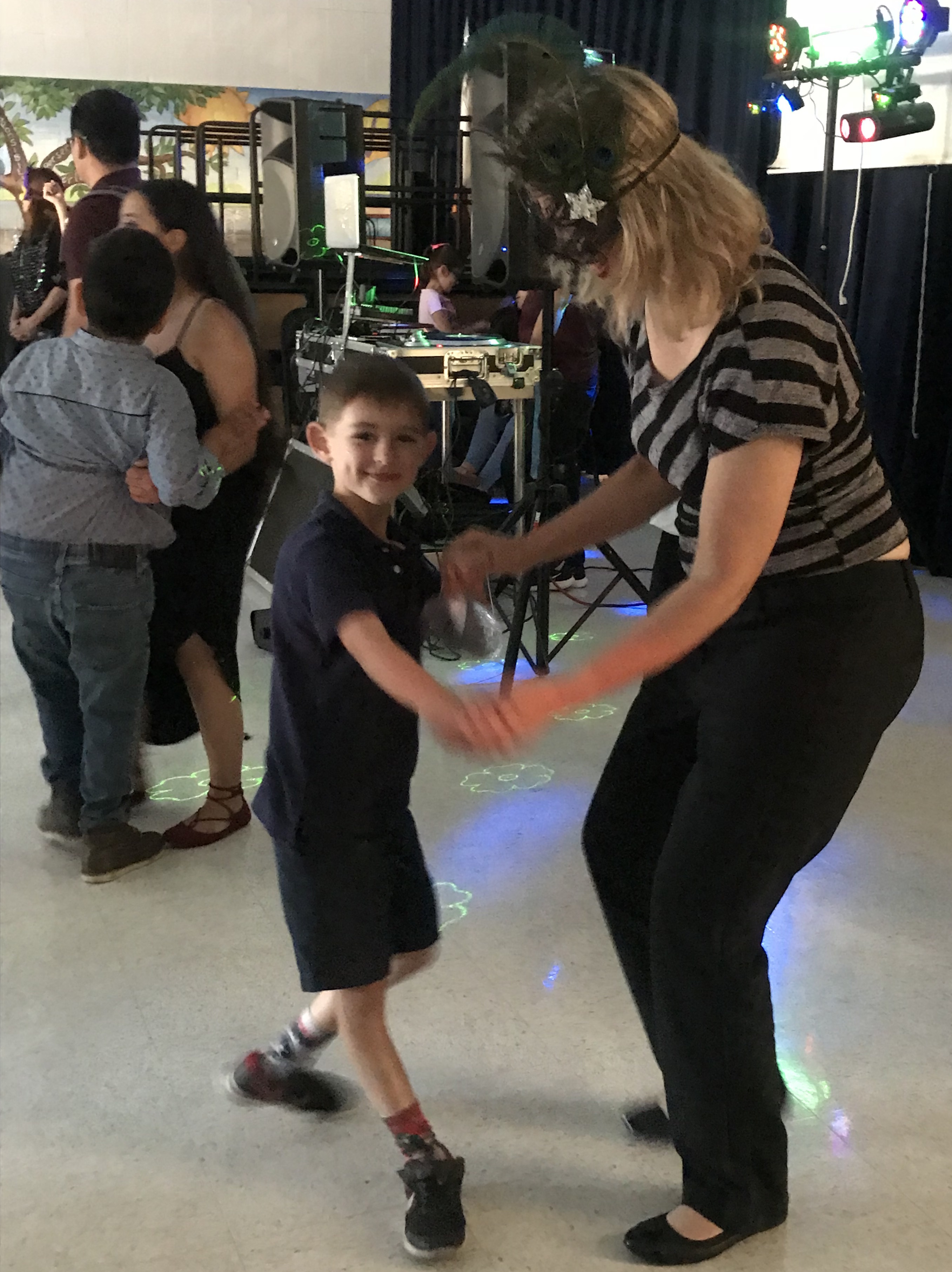 Mothers and sons have a great time dancing it out at the annual mother son dance!