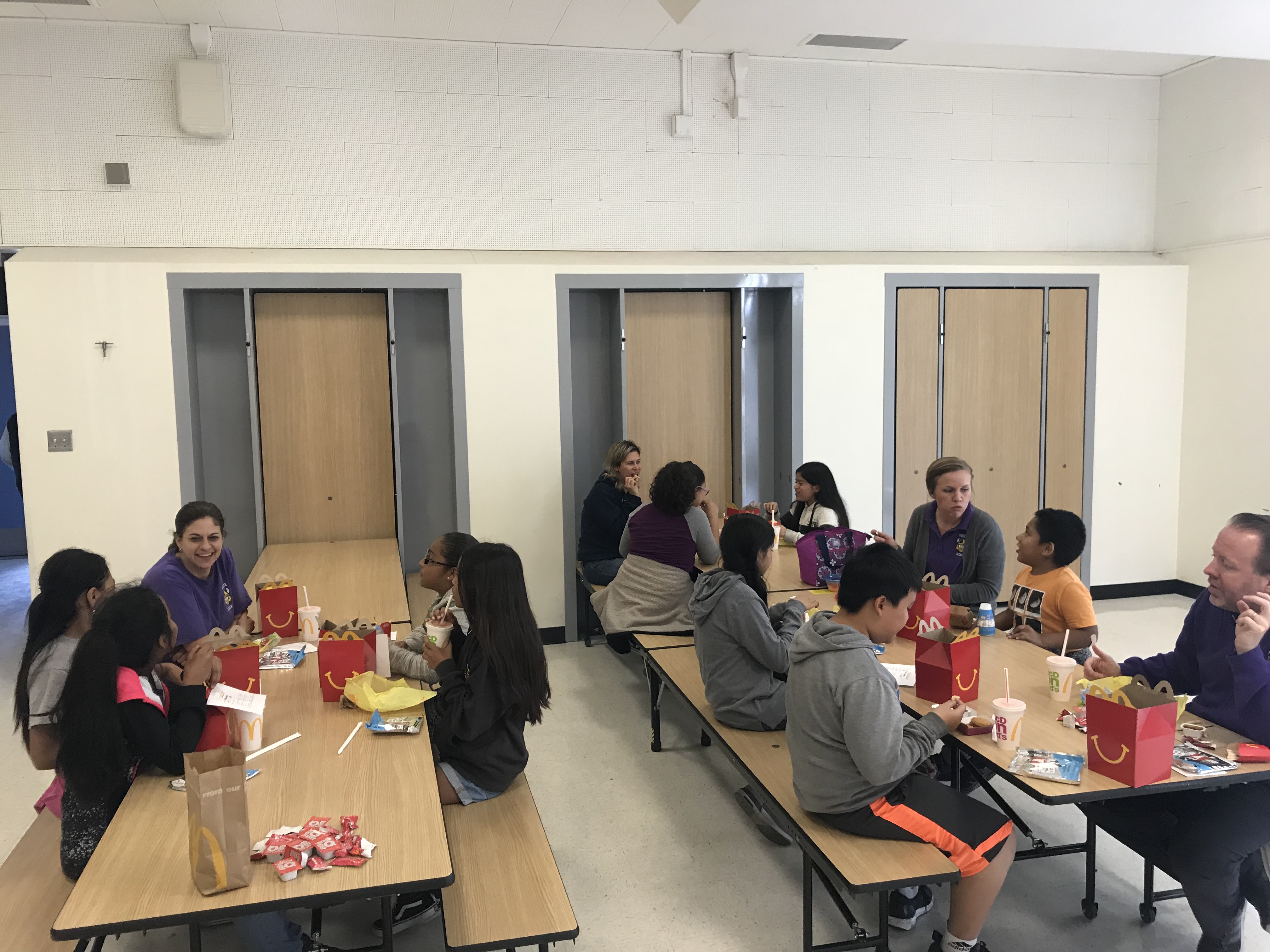 Students and teachers spend lunch together getting to know one another better as a special reward.